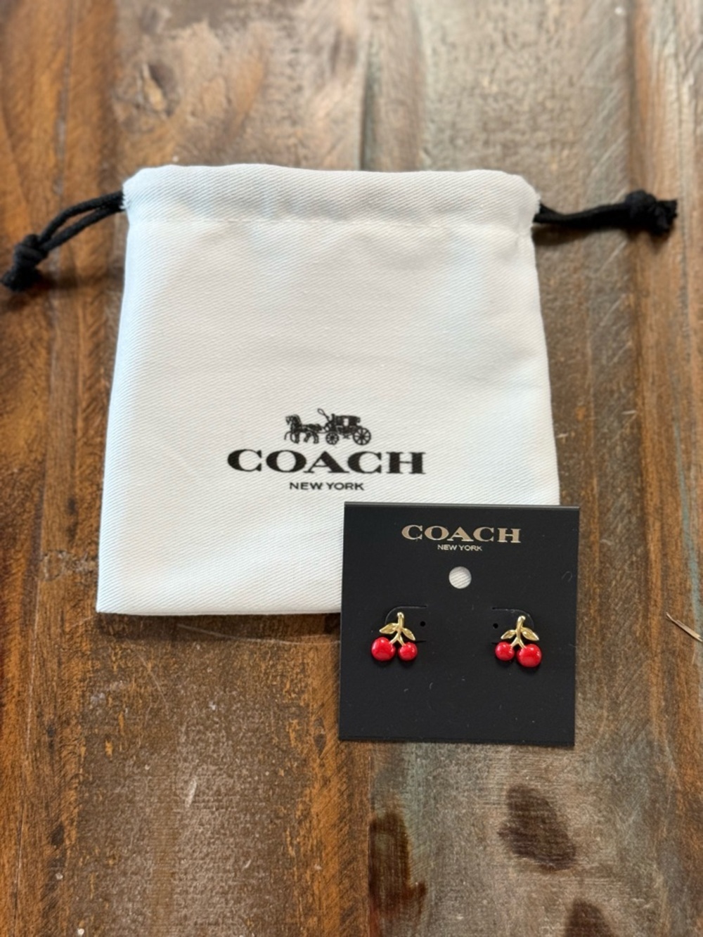COACH Gold Tone + Red Resin Cherry Stud Earrings NWT Includes Dust Bag - Picture 2 of 3